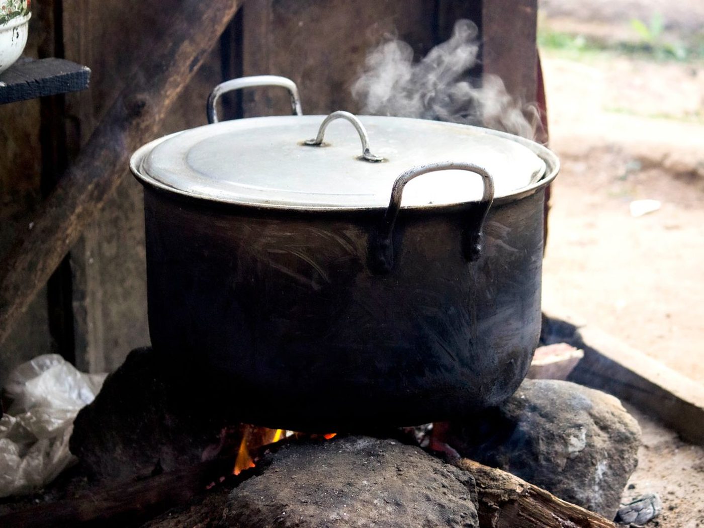 Institutional cooking on firewood, documented in the field